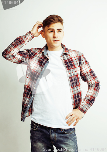 Image of young handsome teenage hipster guy posing emotional, happy smiling against white background isolated, lifestyle people concept