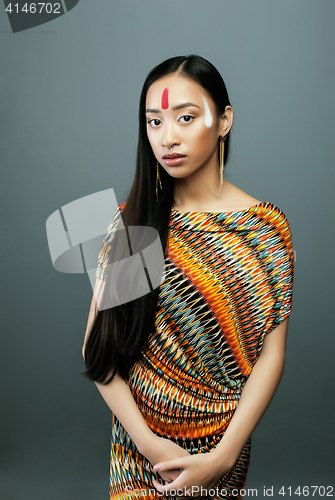 Image of beauty young asian girl with make up like Pocahontas, red indian