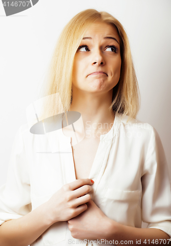 Image of young blond woman on white backgroung gesture thumbs up, isolate