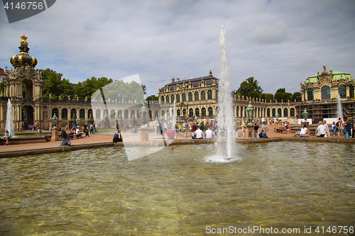 Image of DRESDEN, GERMANY – AUGUST 13, 2016: Tourists walk and visit Dr