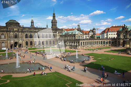 Image of DRESDEN, GERMANY – AUGUST 13, 2016: Tourists walk and visit Dr