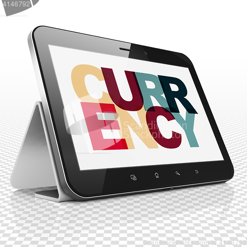 Image of Money concept: Tablet Computer with Currency on  display