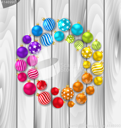 Image of Set Colorful Christmas Glass Balls on Wooden Background
