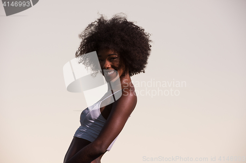 Image of young black woman in nature