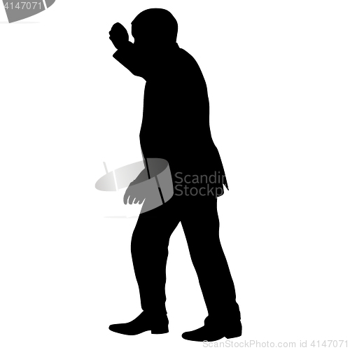 Image of Silhouette of a man with his hand raised. illustration