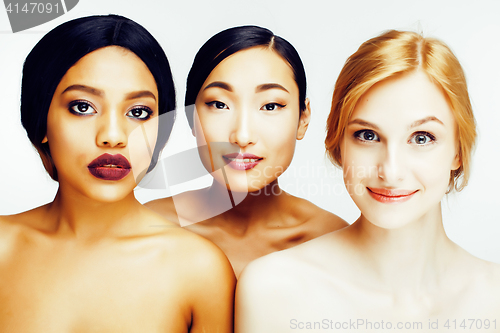 Image of three different nation woman: asian, african-american, caucasian together isolated on white background happy smiling, diverse type on skin, lifestyle people concept