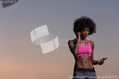 Image of young african american woman in nature