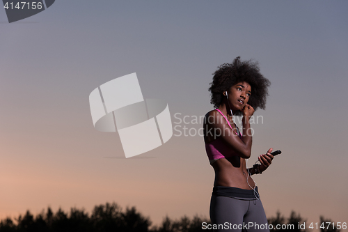 Image of young african american woman in nature