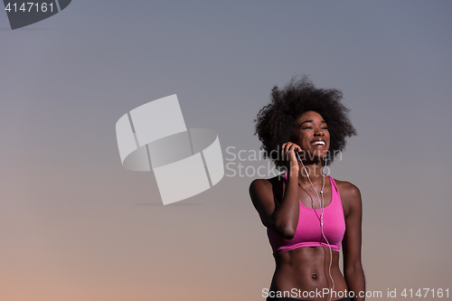 Image of young african american woman in nature