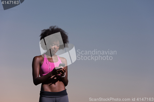 Image of young african american woman in nature