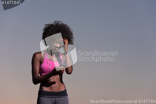 Image of young african american woman in nature