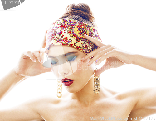 Image of young pretty modern girl with bright shawl on head emotional posing isolated on white background, asian people ethnicity