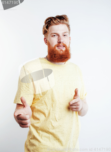 Image of young handsome hipster ginger bearded guy looking brutal isolated on white background, lifestyle people concept