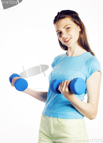 Image of young pretty slim woman with dumbbell isolated cheerful smiling, real sport girl next door, lifestyle people concept