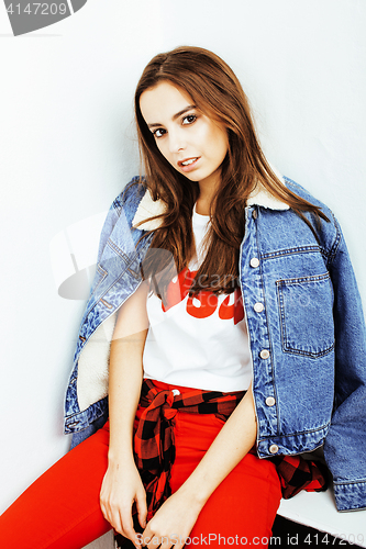 Image of young pretty stylish hipster girl posing emotional isolated on white background happy smiling cool smile, lifestyle people concept