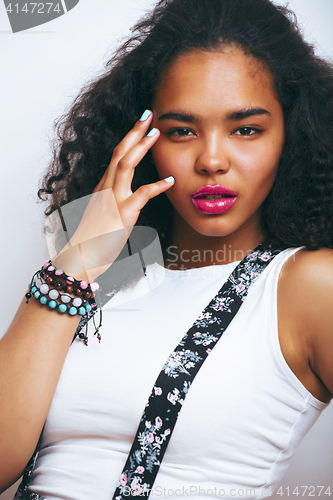 Image of young pretty african-american teenage woman posing in fashion clothers emotional, lifestyle people concept