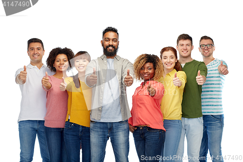 Image of international group of people showing thumbs up