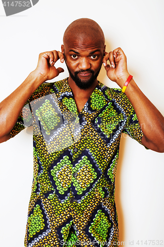 Image of portrait of young handsome african man wearing bright green nati