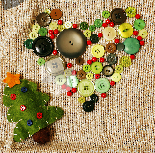 Image of lot of stuff for handmade gifts, scissors, ribbon, paper with co