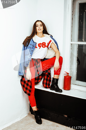 Image of young pretty stylish hipster girl posing emotional isolated on white background happy smiling cool smile, lifestyle people concept