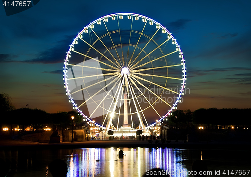 Image of Ferris wheel and Seine