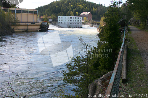 Image of Powerplant and river.