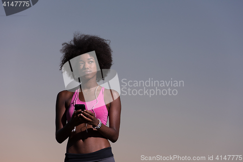 Image of young african american woman in nature