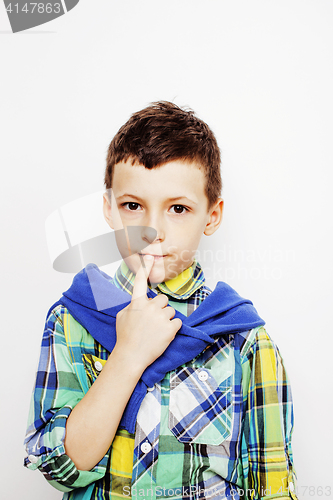 Image of young pretty little boy kid wondering, posing emotional face isolated on white background, gesture happy smiling close up, lifestyle people concept