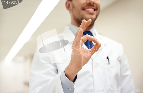 Image of close up of doctor at hospital showing ok sign