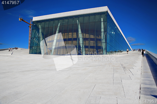 Image of OSLO, NORWAY – AUGUST 17, 2016: Tourist on the Oslo Opera Hous