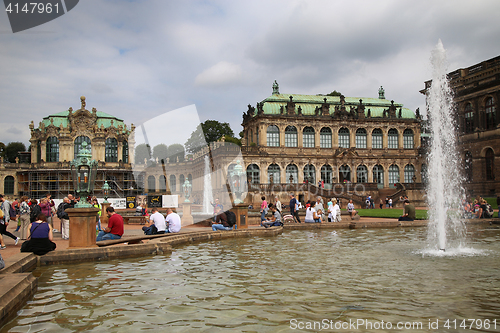 Image of DRESDEN, GERMANY – AUGUST 13, 2016: Tourists walk and visit Dr