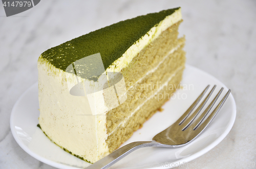 Image of Green tea cake on table 