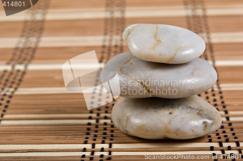 Image of stones on wood mat