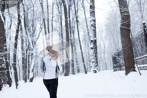 Image of Photo of young woman running