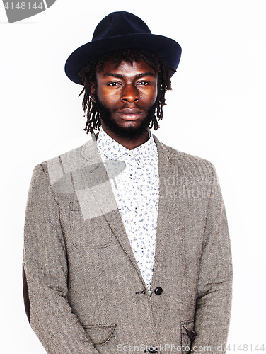 Image of young handsome afro american boy in stylish hipster hat gesturin