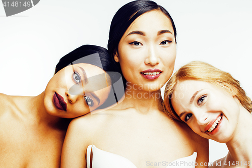 Image of three different nation woman: asian, african-american, caucasian together isolated on white background happy smiling, diverse type on skin, lifestyle people concept