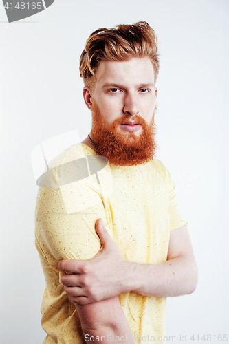 Image of young handsome hipster ginger bearded guy looking brutal isolated on white background, lifestyle people concept