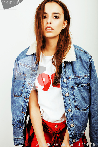 Image of young pretty stylish hipster girl posing emotional isolated on white background happy smiling cool smile, lifestyle people concept