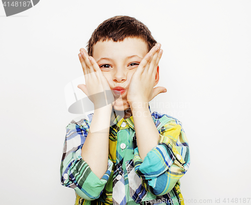 Image of young pretty little boy kid wondering, posing emotional face isolated on white background, gesture happy smiling close up, lifestyle people concept