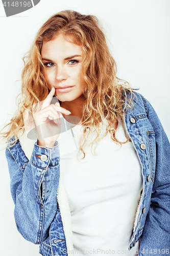 Image of pretty young curly blond teenage girl hipster emotional posing happy smiling on white background, lifestyle people concept