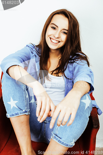 Image of young pretty stylish hipster girl posing emotional isolated on white background happy smiling cool smile, lifestyle people concept