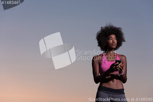 Image of young african american woman in nature