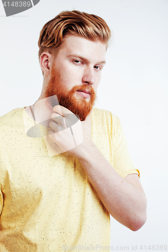 Image of young handsome hipster ginger bearded guy looking brutal isolated on white background, lifestyle people concept