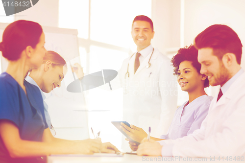 Image of group of doctors on presentation at hospital