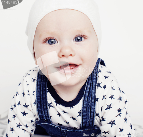 Image of little cute baby toddler on carpet isolated close up smiling, lifestyle people concept