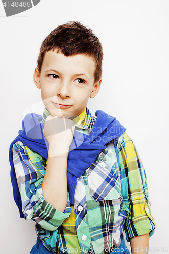 Image of young pretty little boy kid wondering, posing emotional face isolated on white background, gesture happy smiling close up, lifestyle people concept