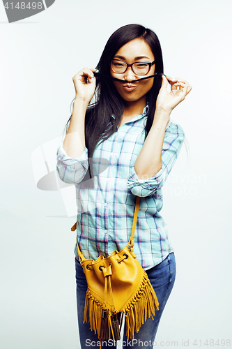 Image of young pretty asian woman posing cheerful emotional isolated on white background, lifestyle people concept