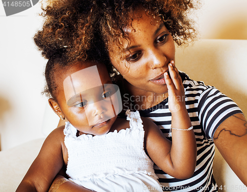 Image of adorable sweet young afro-american mother with cute little daugh