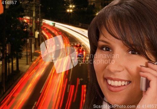 Image of Businesswoman at night