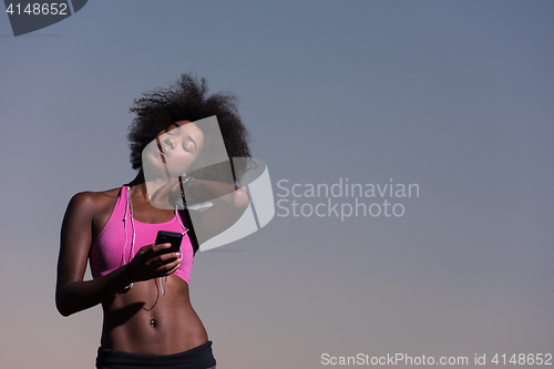 Image of young african american woman in nature